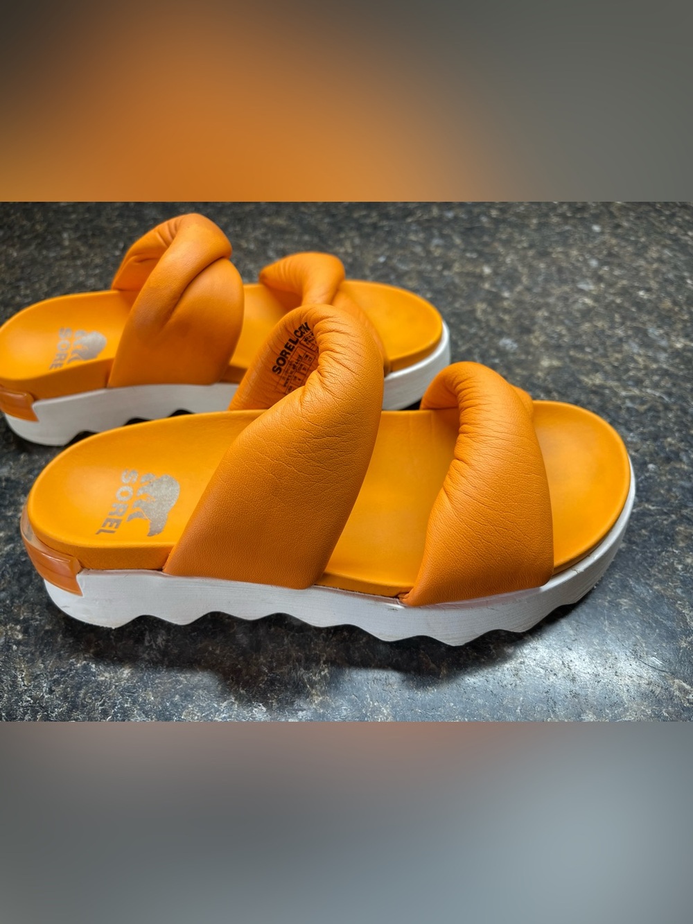 Sorel Women’s VIIBE TWIST Slides in Tangerine with signature Sorel sole